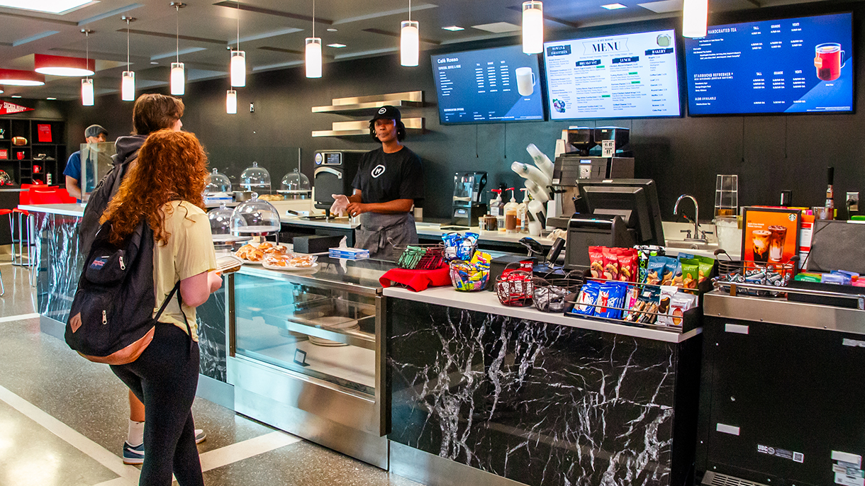 College students waiting in line at a campus cafe