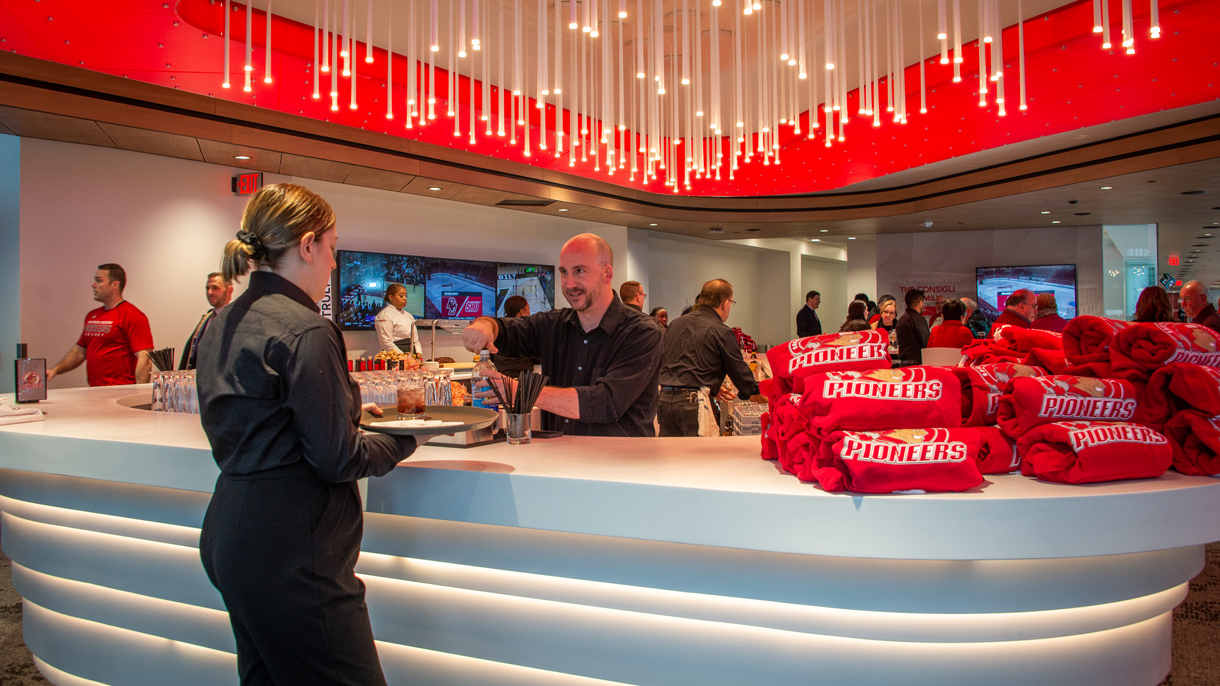Server and bartender talking