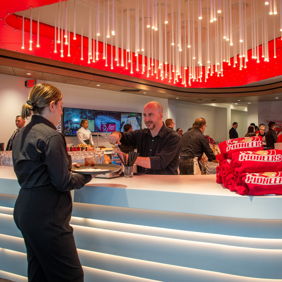 Server and bartender talking