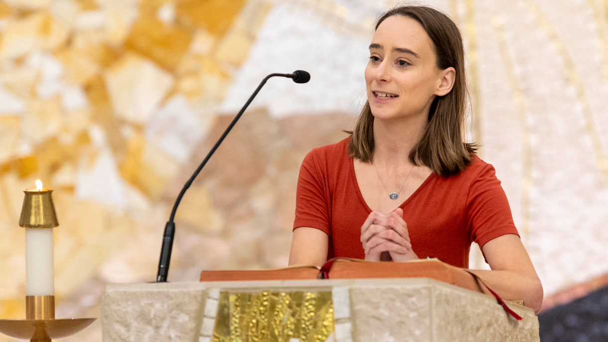 Person speaking at the altar