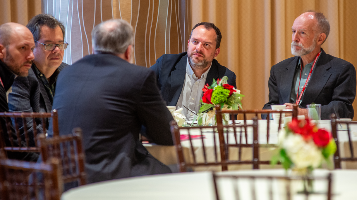 Catholic Studies Symposium participants engage in discussions