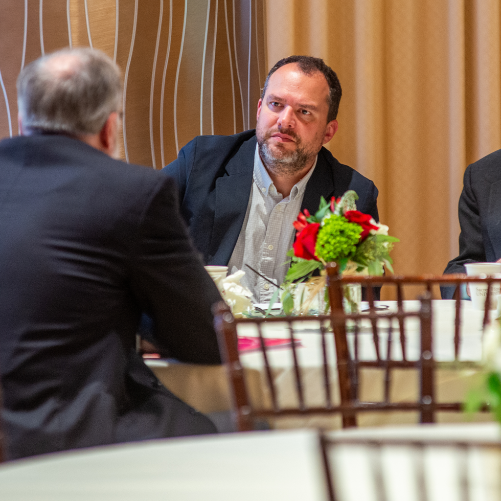 Catholic Studies Symposium participants engage in discussions