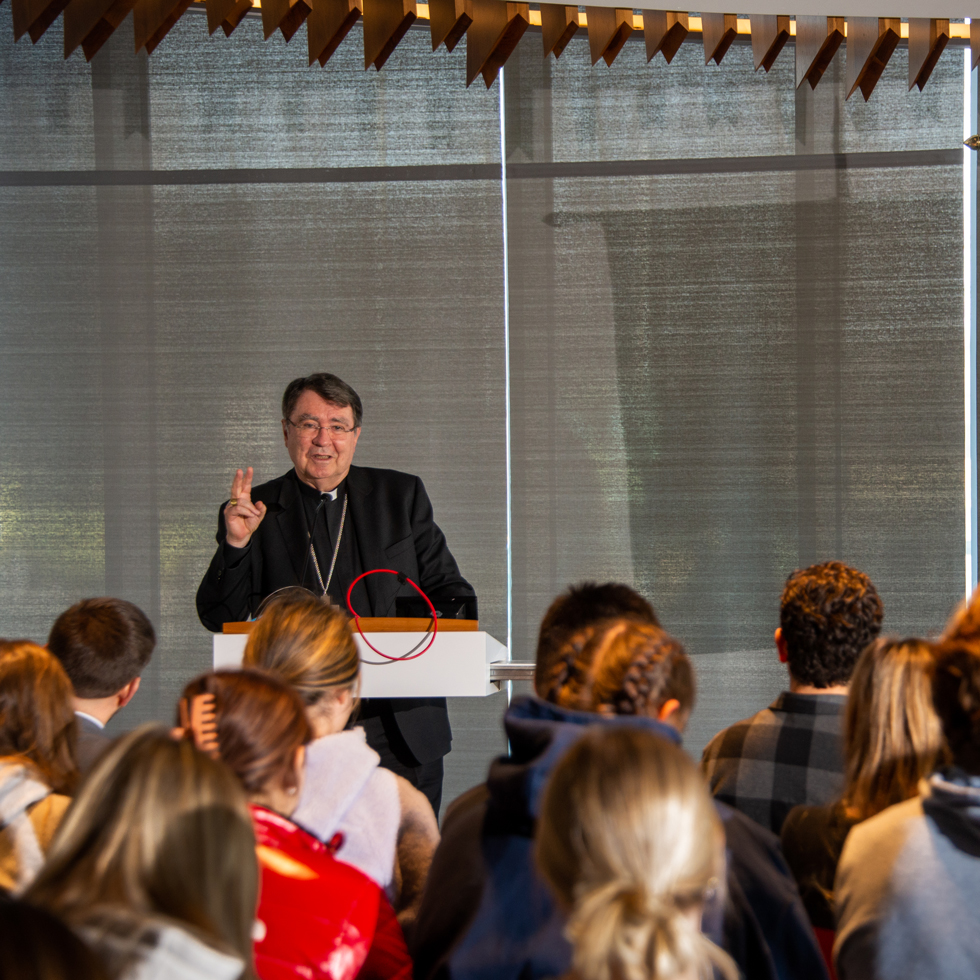 Archbishop Christophe Pierre, Apostolic Nuncio speaking to audience