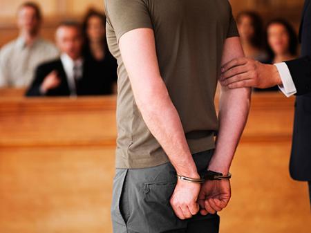 a person in handcuffs
