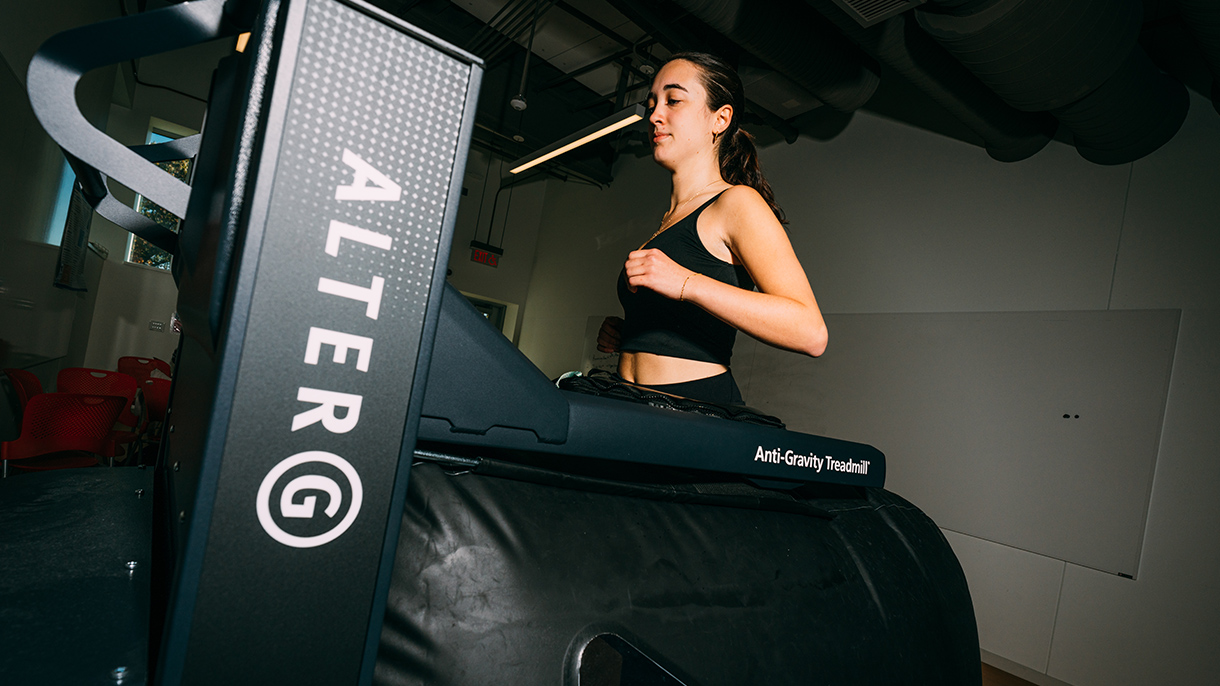 a person running on an anti-gravity treadmill
