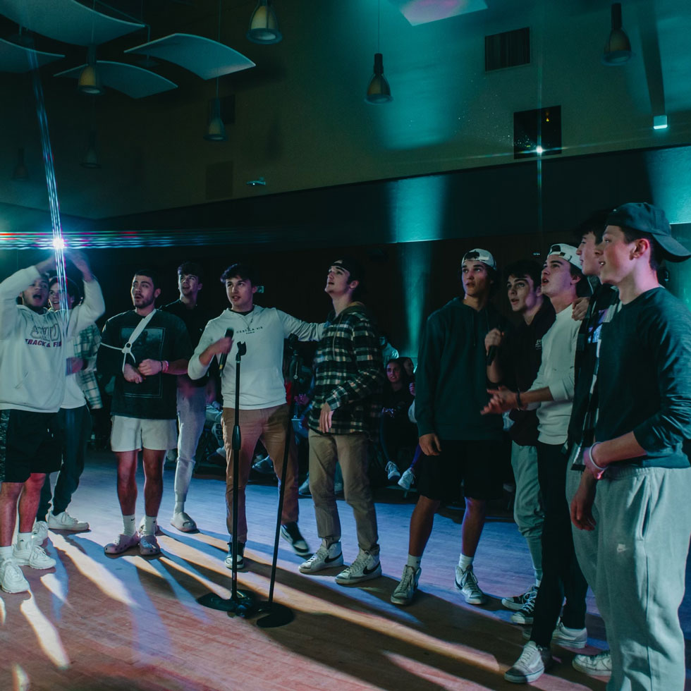 Members of Beta Theta Pi singing together