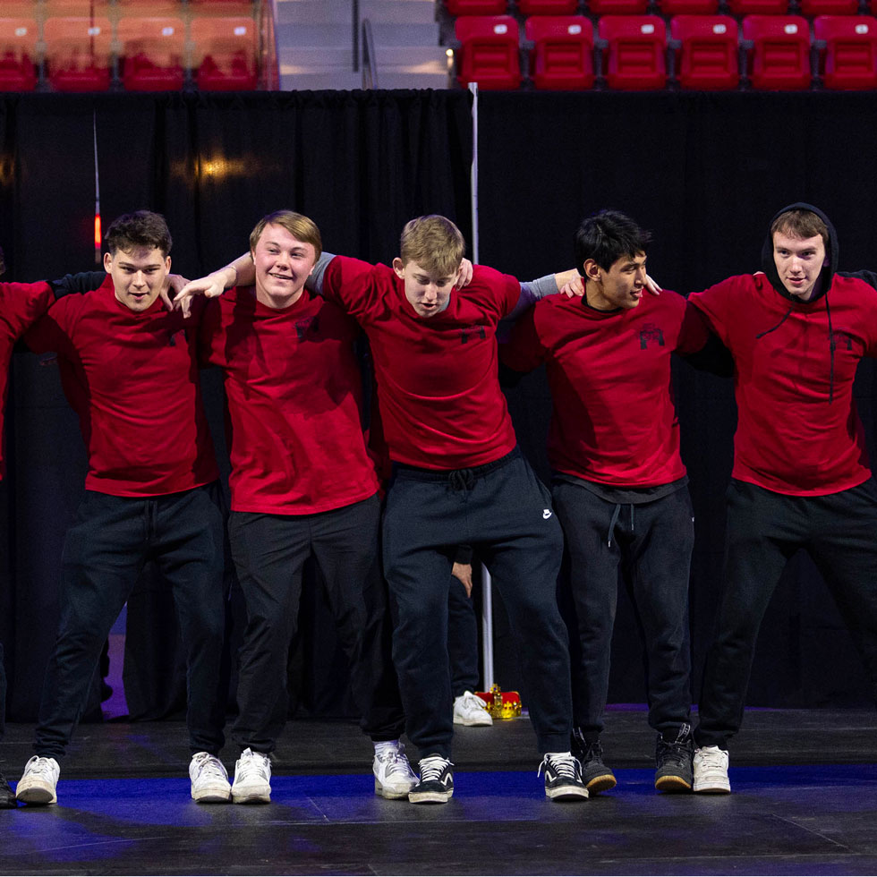 Members of Kappa Sigma performing at Greek sing