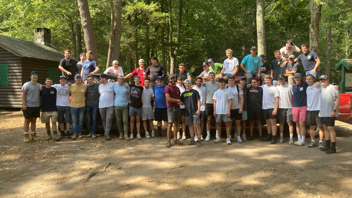 Members of Sigma Chi at a brotherhood event in the wilderness