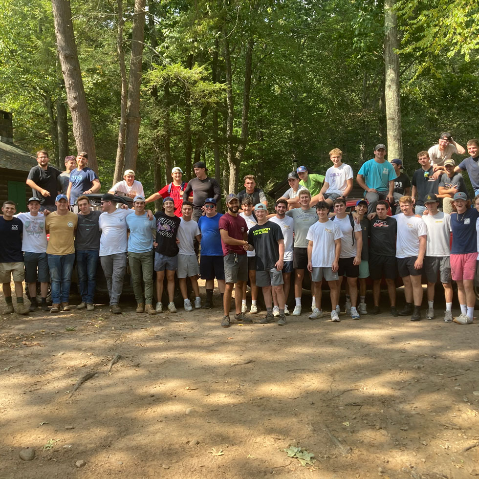 Members of Sigma Chi at a brotherhood event in the wilderness