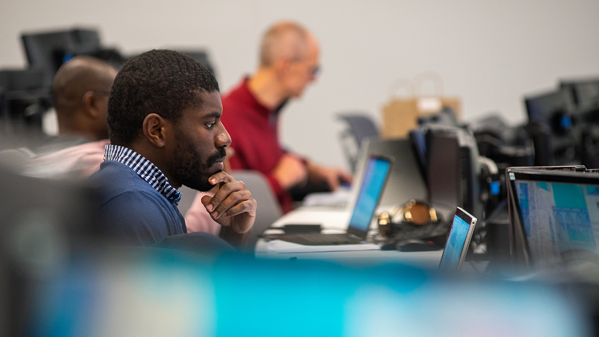DBA students working in SHU's finance lab