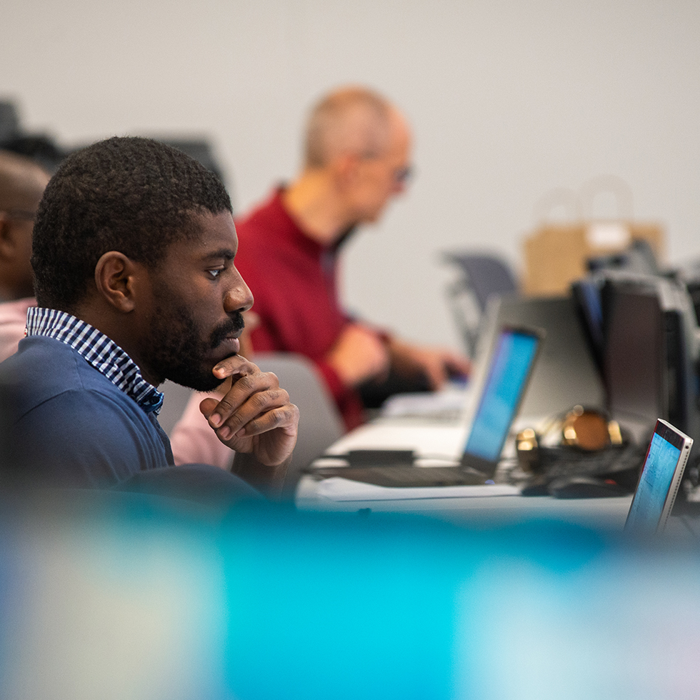 DBA students working in SHU's finance lab