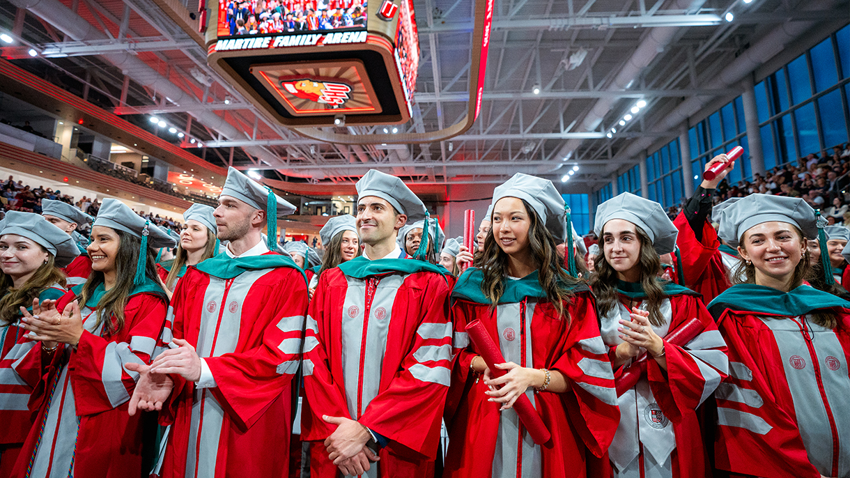 doctoral students at a commencement ceremony