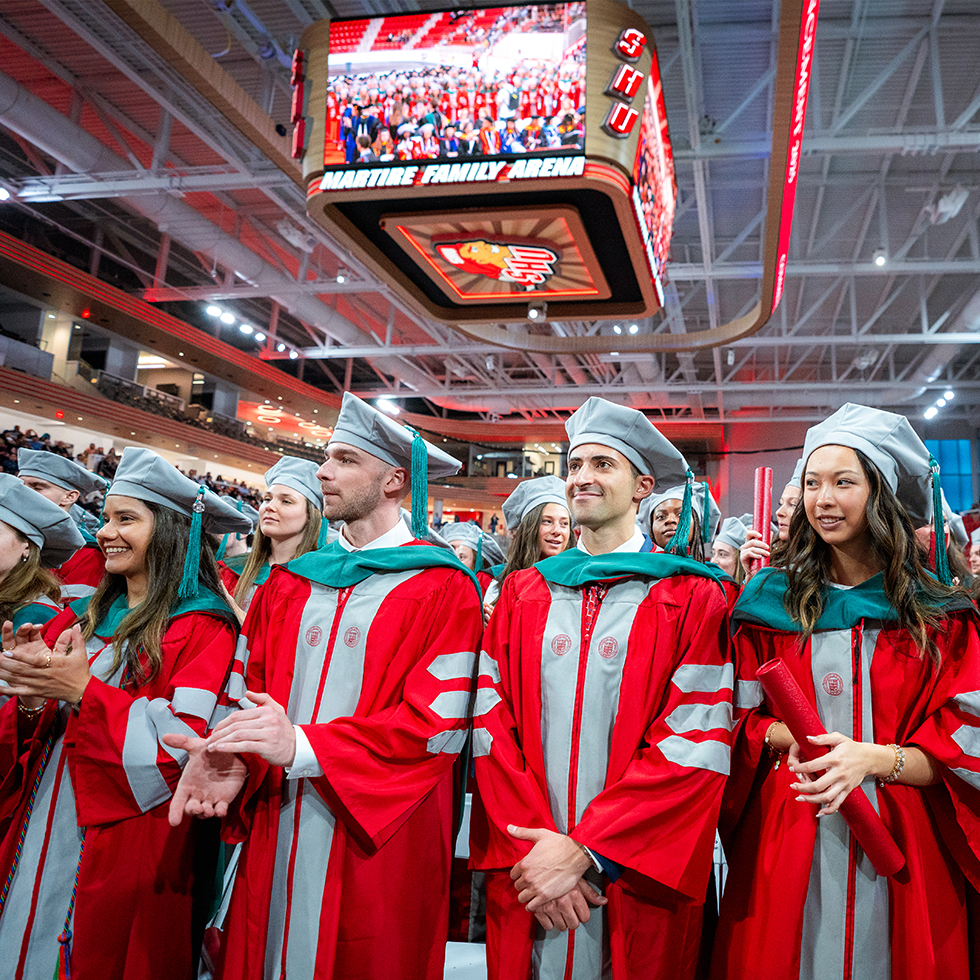 doctoral students at a commencement ceremony