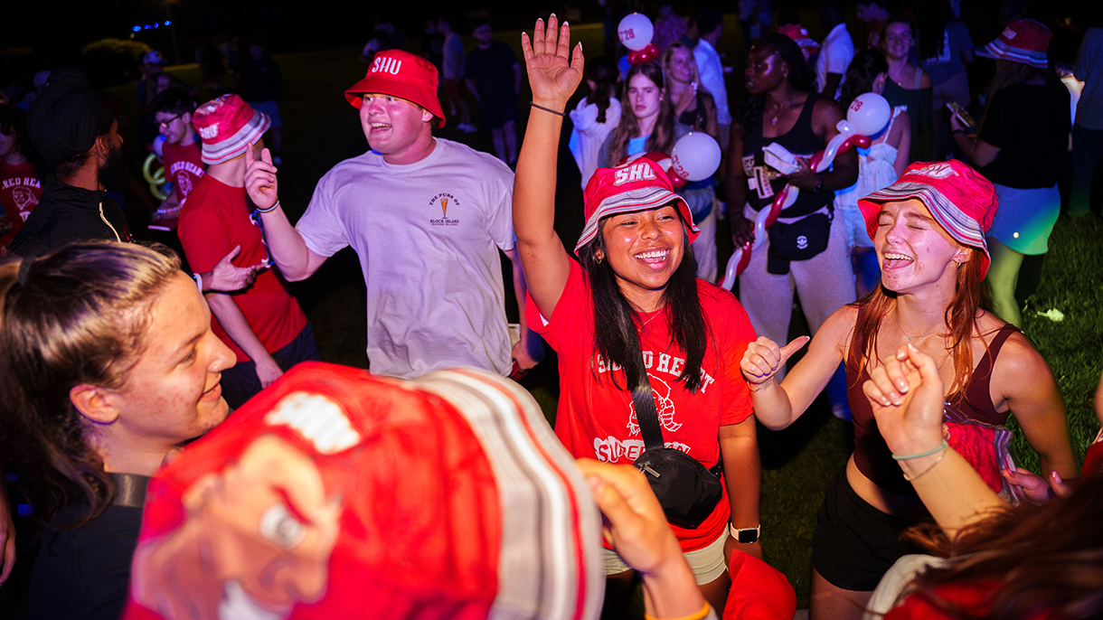 college students laughing and dancing