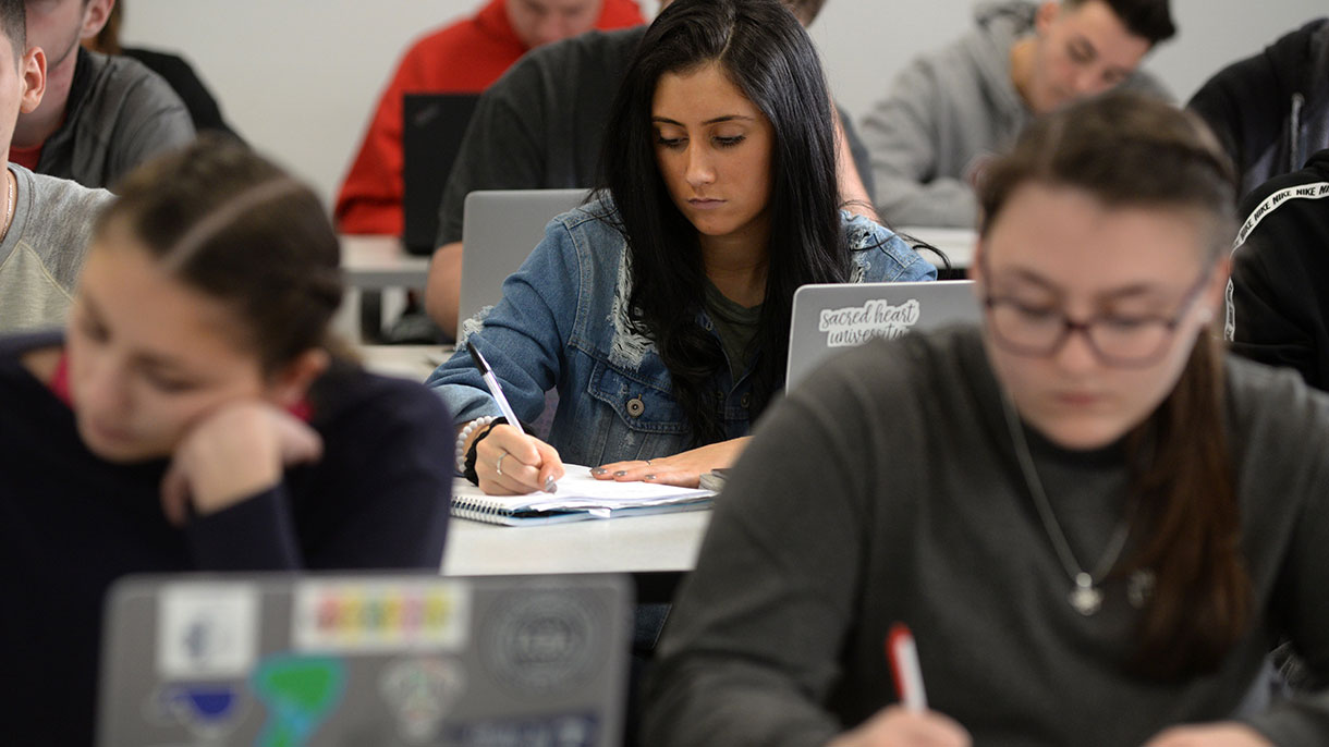 students taking notes in class