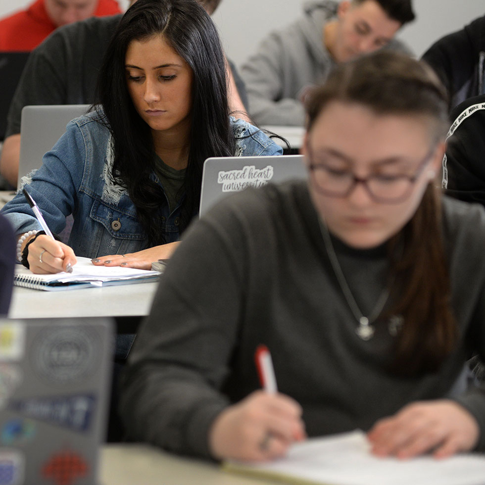 students taking notes in class