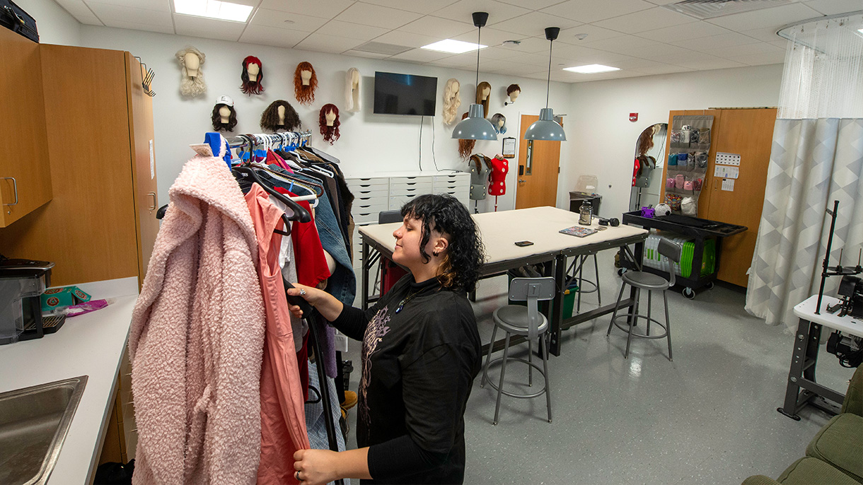 Sage Sperling works in the costume shop