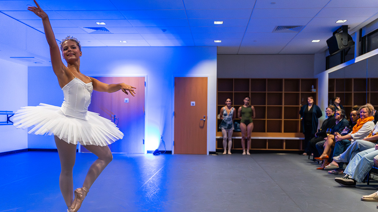 a ballerina in a dance studio