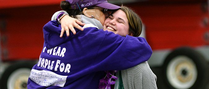 Two people hugging