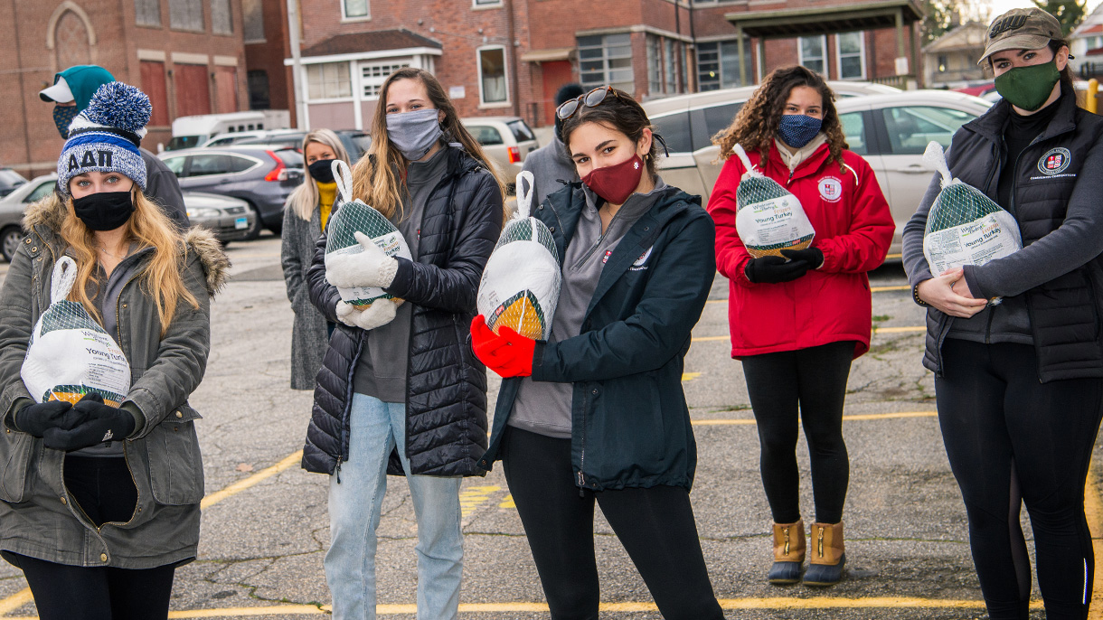 college students with Thanksgiving turkeys