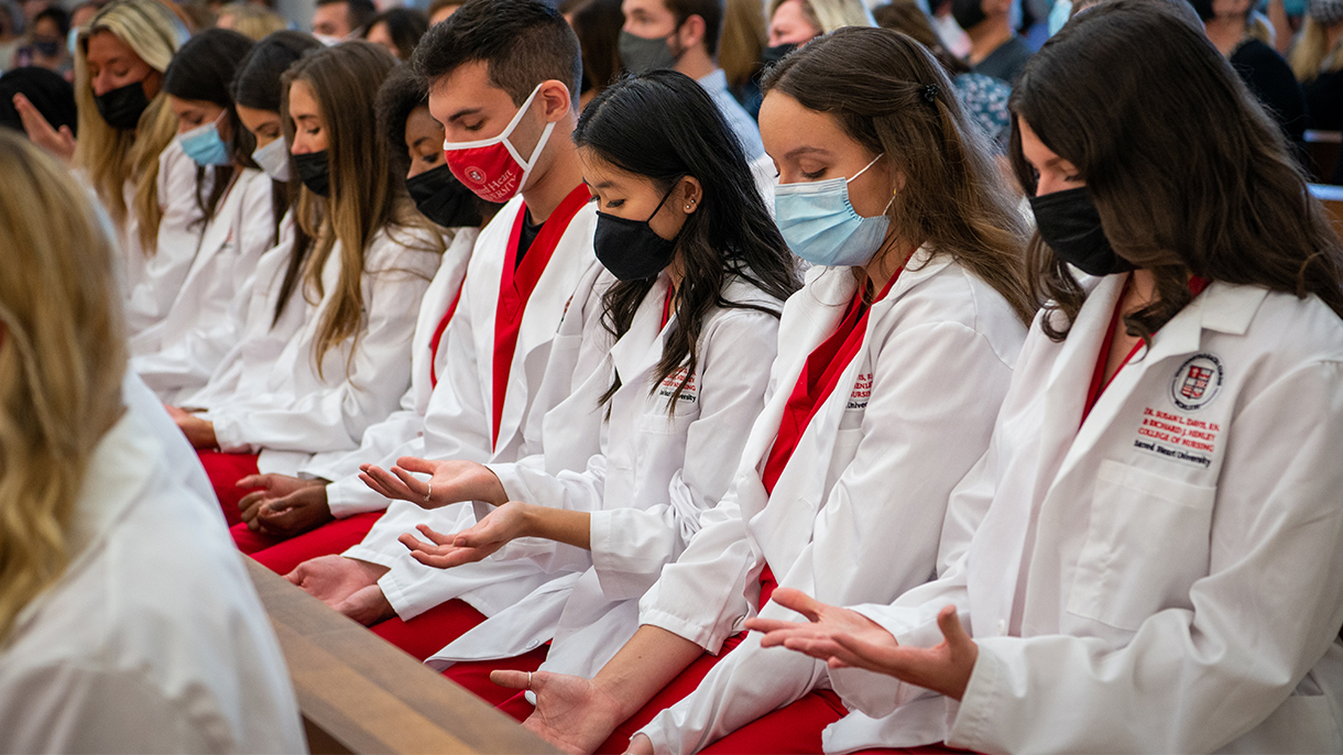 nursing students looking at their hands