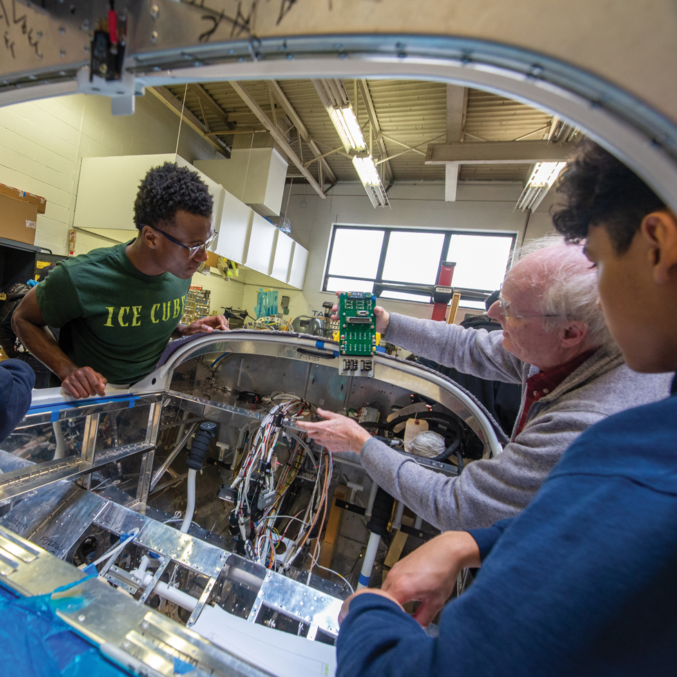 People building an airplane