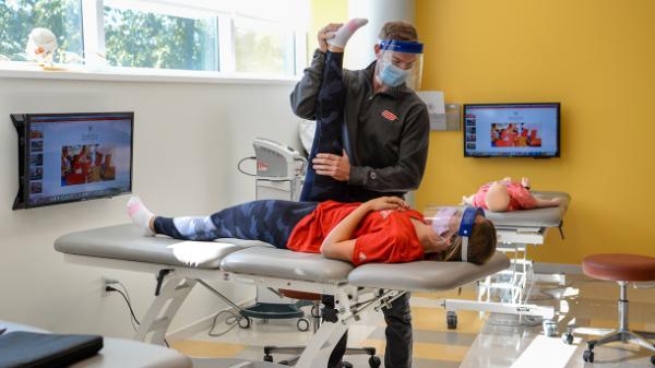 students working in an athletic training lab