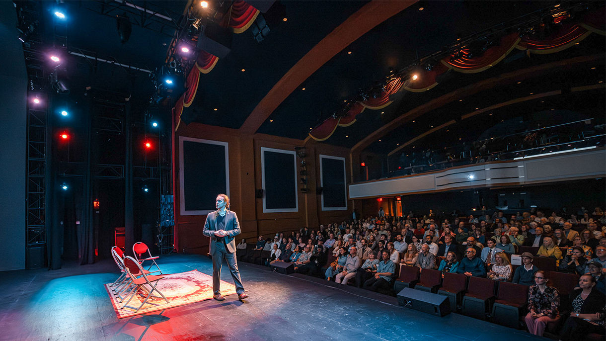Tomas Koeck speaking onstage