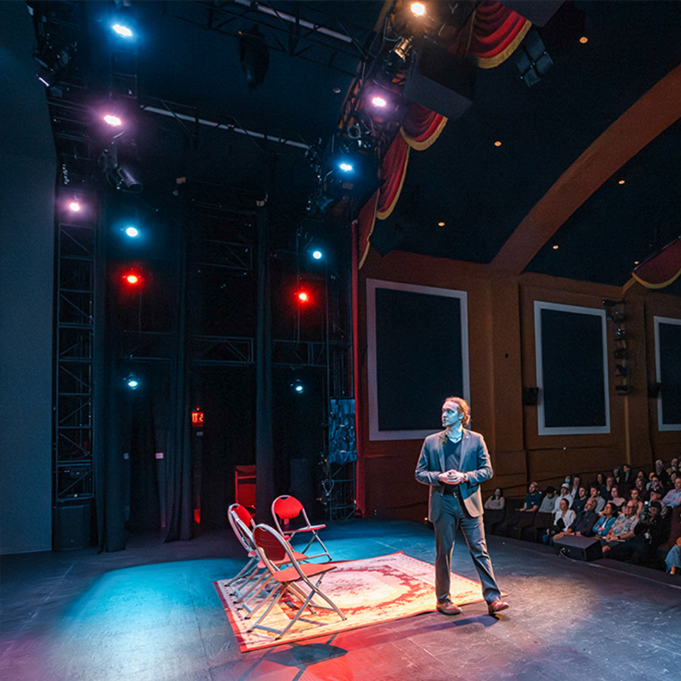 Tomas Koeck speaking onstage