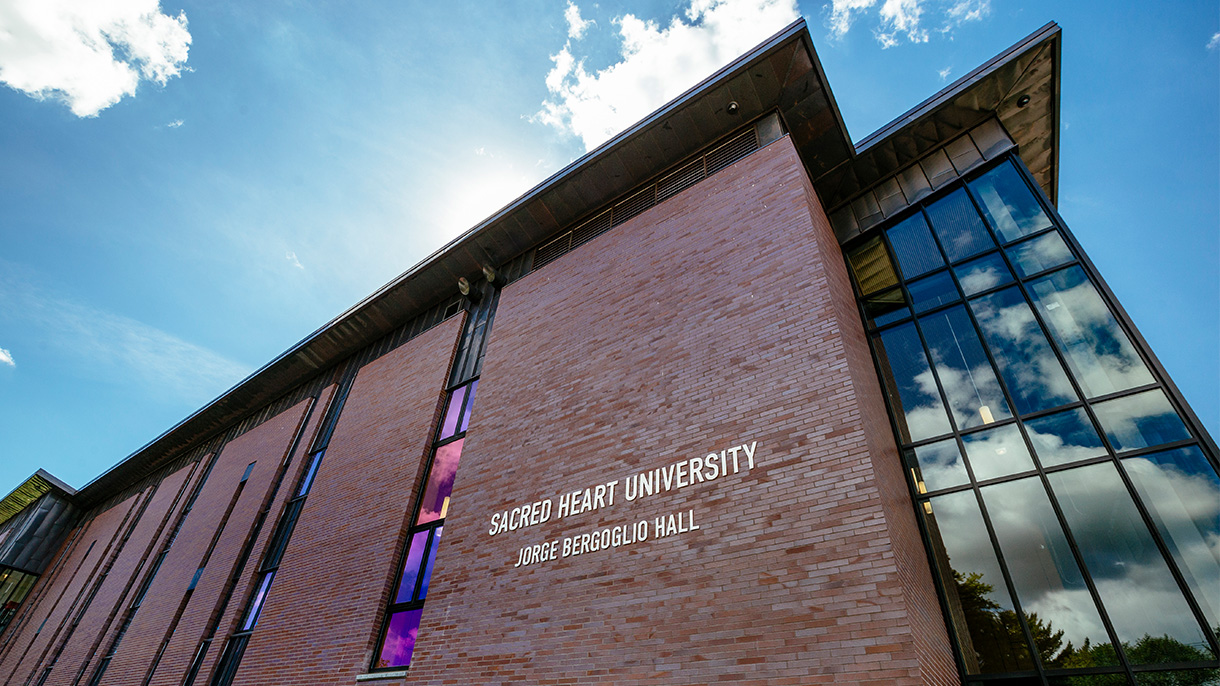 Jorge Bergoglio Hall exterior sign