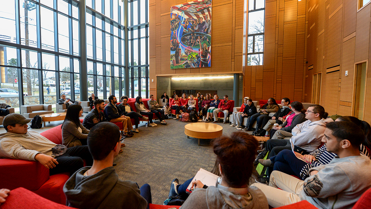 College students gathered in Jorge Bergoglio Hall at Sacred Heart University
