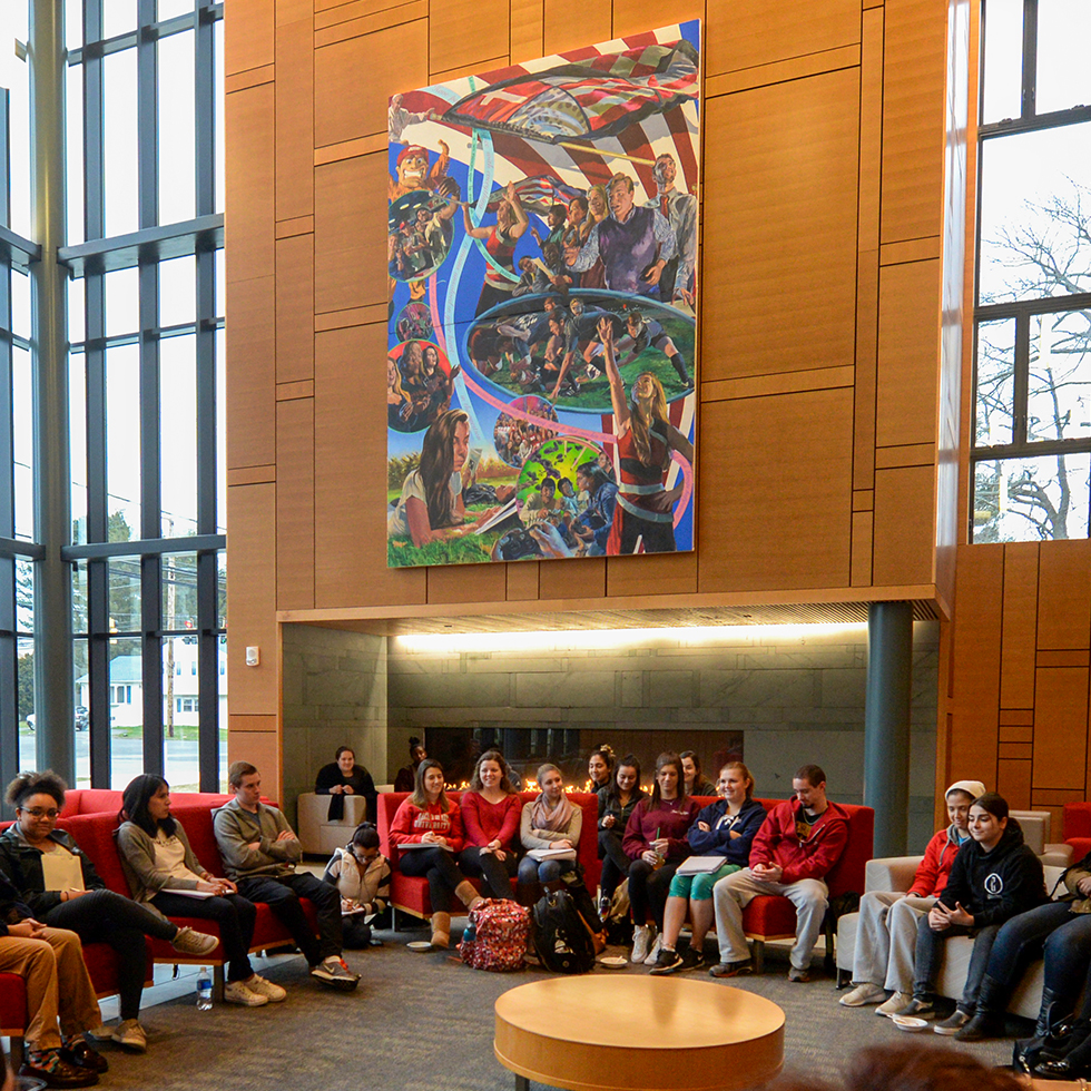 College students gathered in Jorge Bergoglio Hall at Sacred Heart University