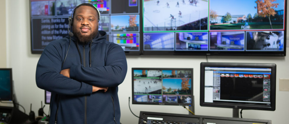 Student in production control room