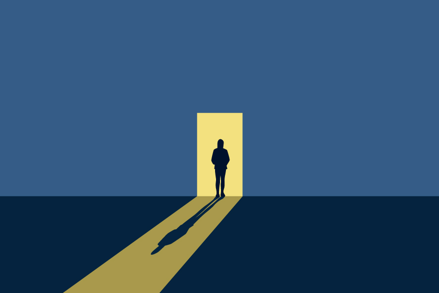 Shadow of a person standing in a doorway