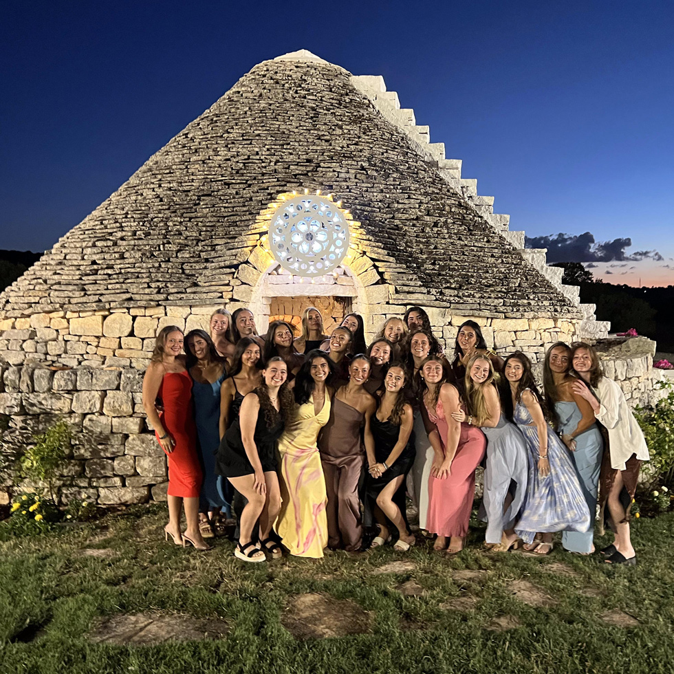 Group of dancers outside at night