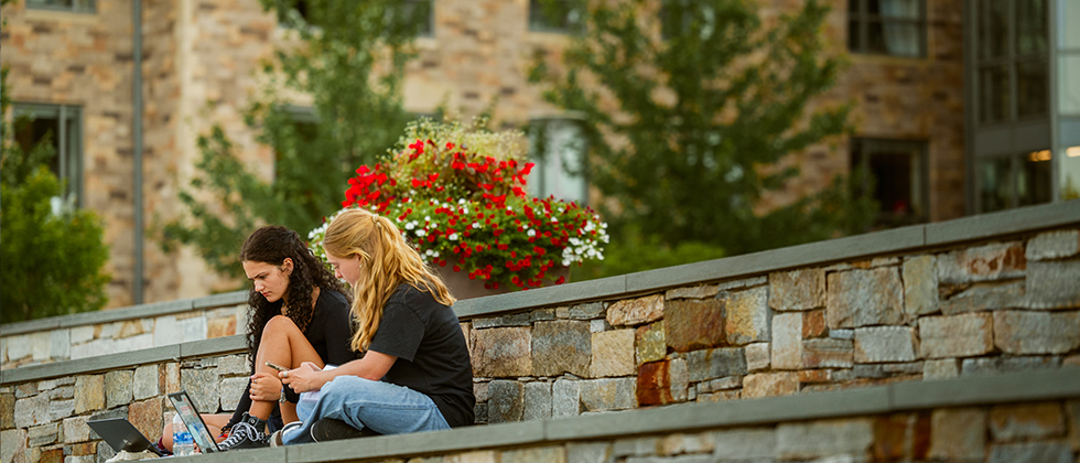 Students sitting on amphitheater steps