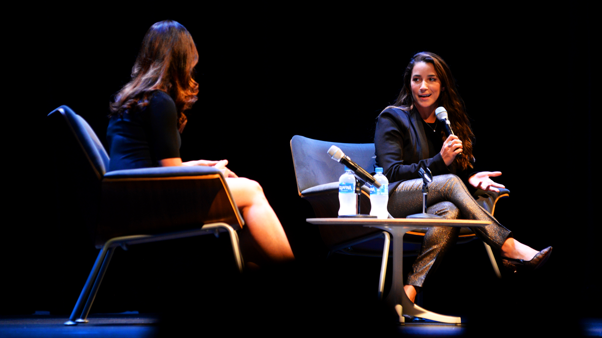 Aly Raisman being interviewed on stage