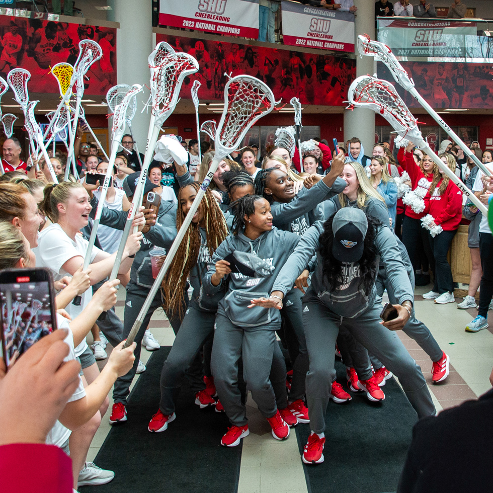Lacrosse team sending off women's basketball team for tournament