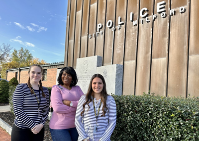 Social Work Students in front of Milford Police Department