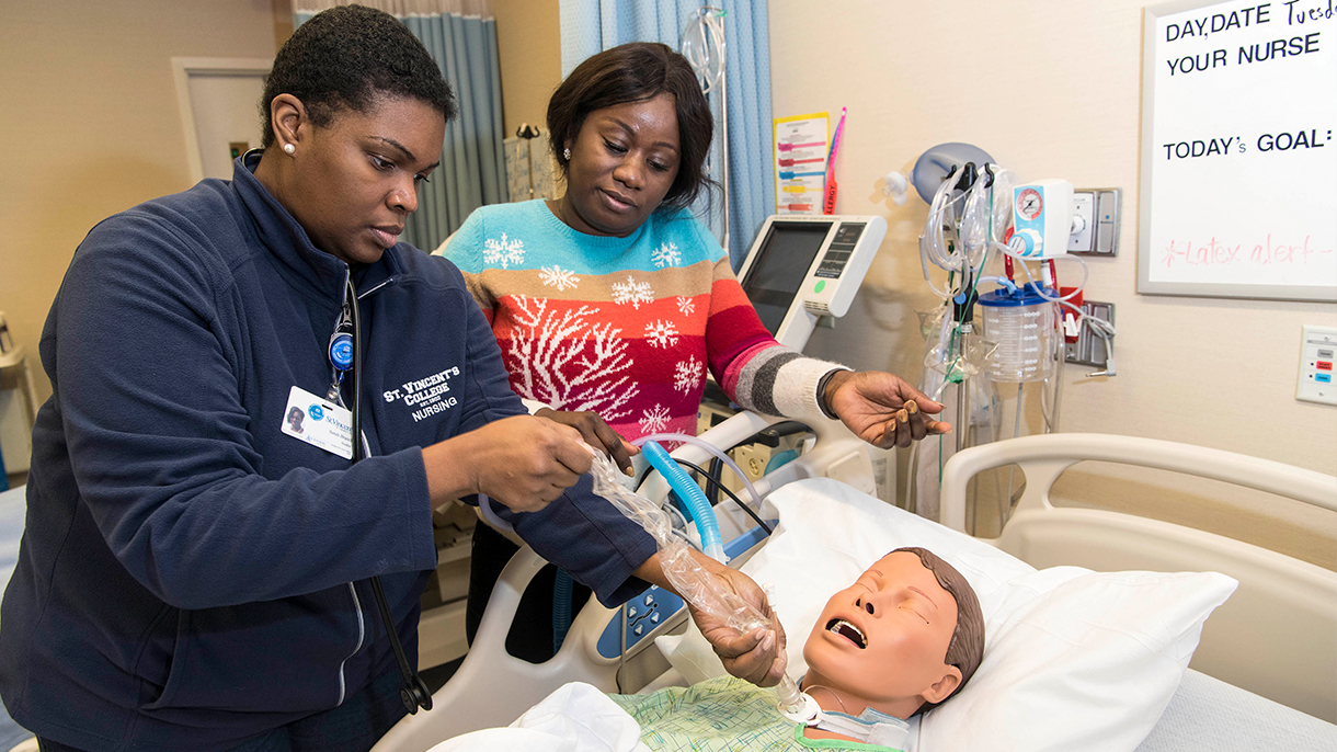 Nursing student with instructor