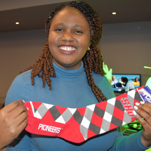 Woman holding SHU socks
