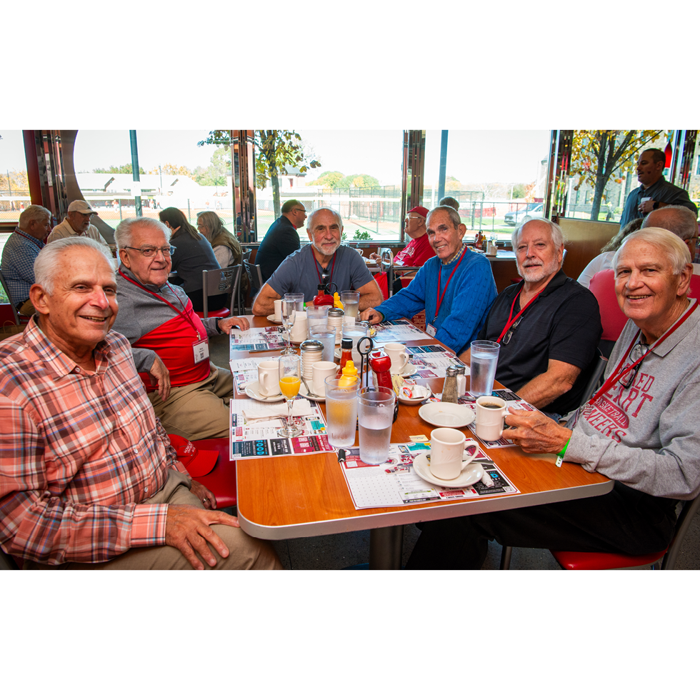 Golden Pioneers eating lunch smiling