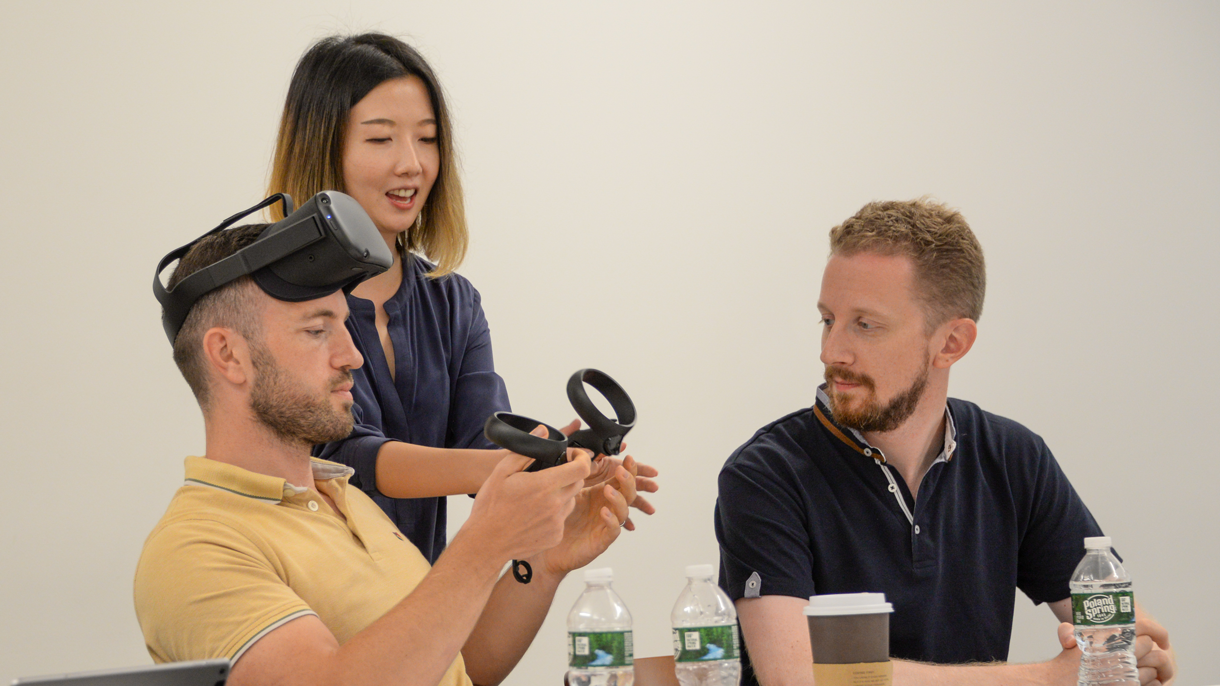 Students with teacher using VR