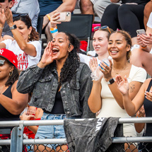 Alumni cheering at football game