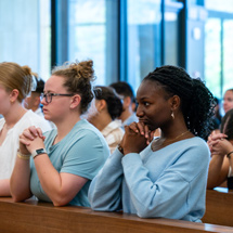 Alumni in chapel praying