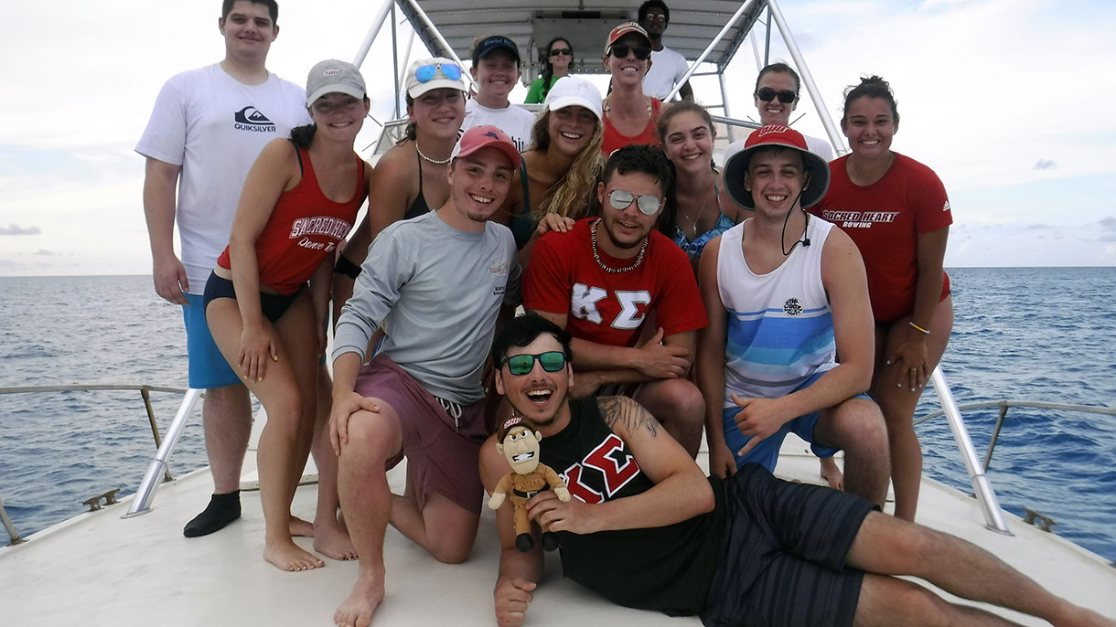 group of students on a boat
