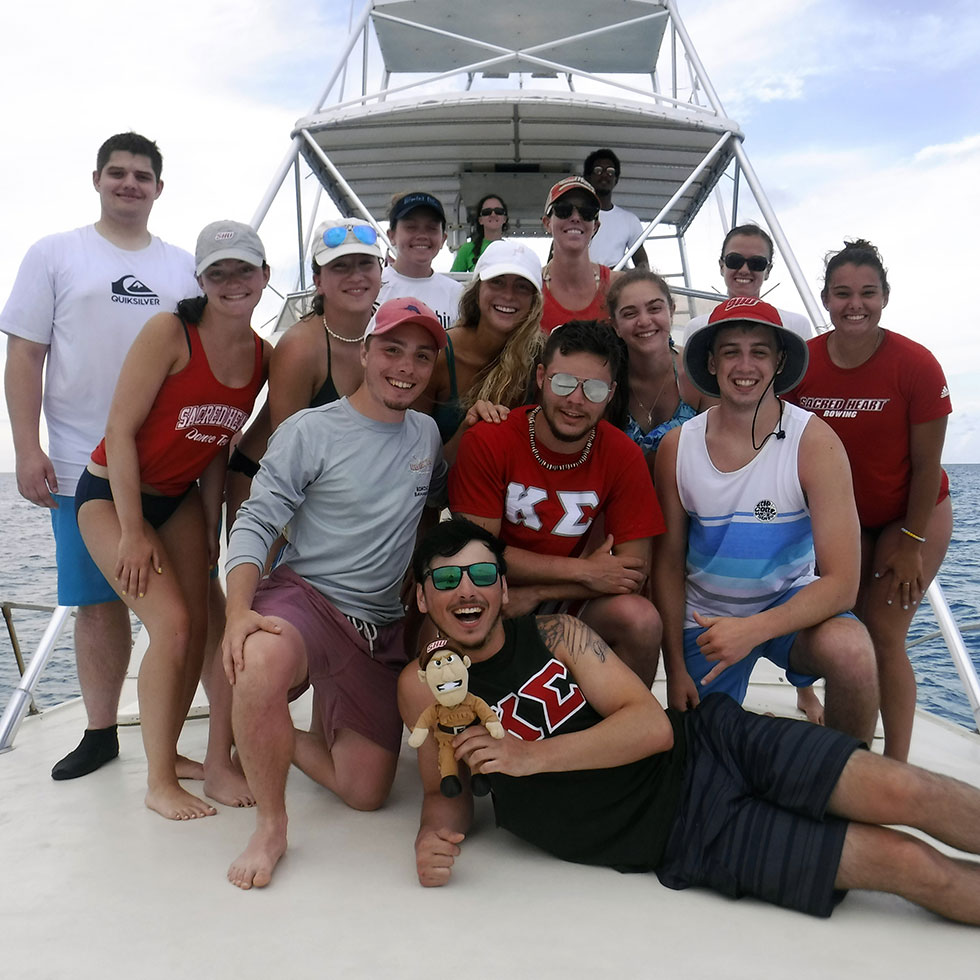 group of students on a boat