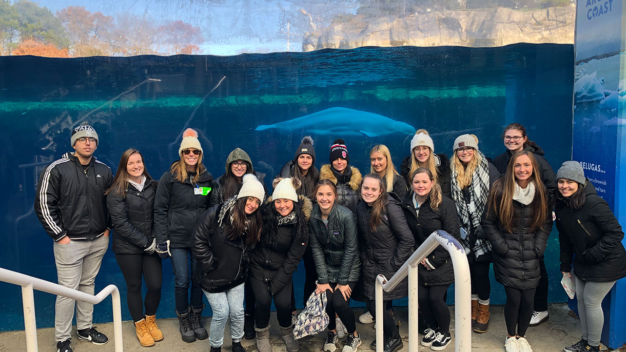 group of students at the aquarium 