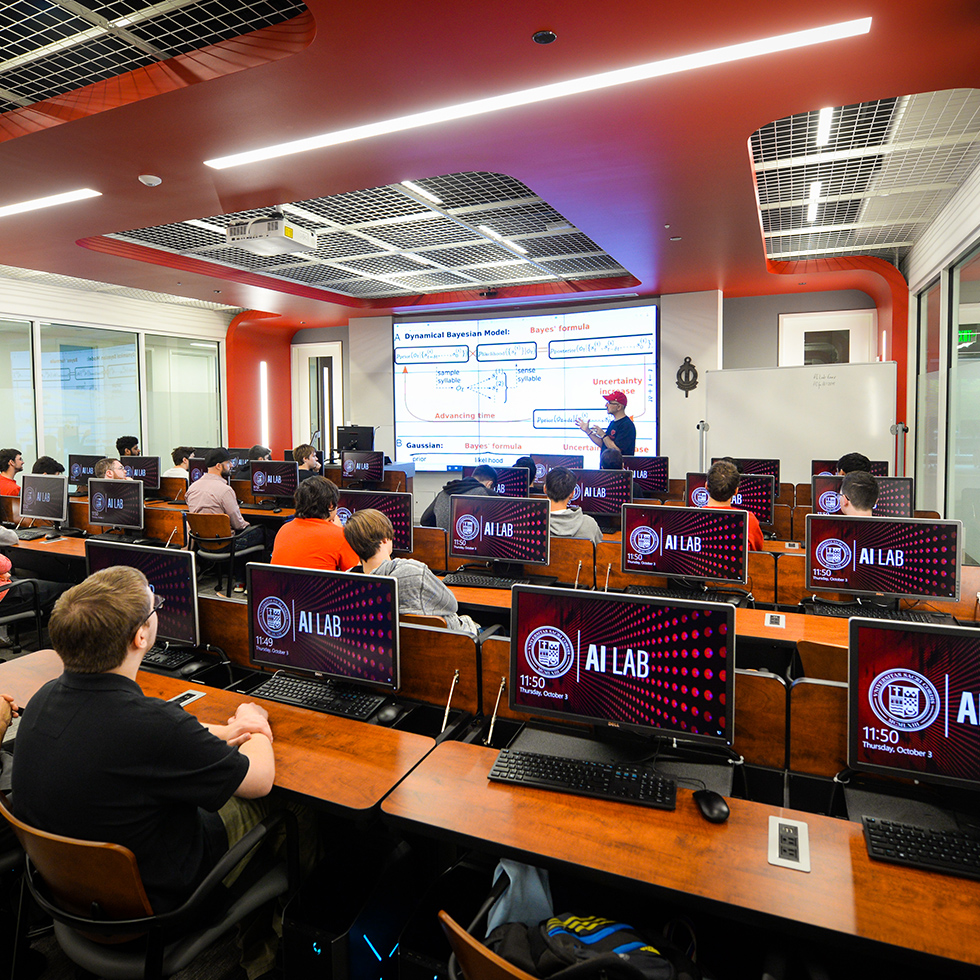 college students in a computer science class
