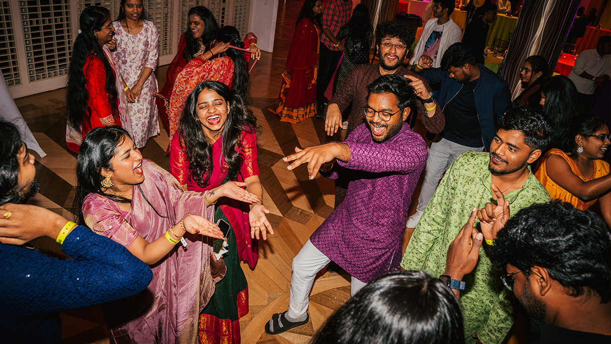 people dancing at a Diwali celebration